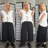 Wendy Trendy anyagában pöttyös bőszárú nadrág240551-fekete