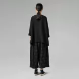 Wendy Trendy anyagában pöttyös bőszárú nadrág240551-fekete